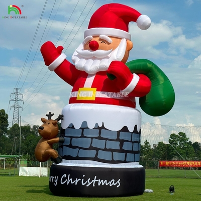 20 ফুট 26 ফুট 33 ফুট বাষ্পযুক্ত সান্তা ক্লাউস চিমনিতে রেনডের সাথে বহিরঙ্গন ক্রিসমাস সজ্জা সান্তা ক্লাউসকে উড়িয়ে দিন